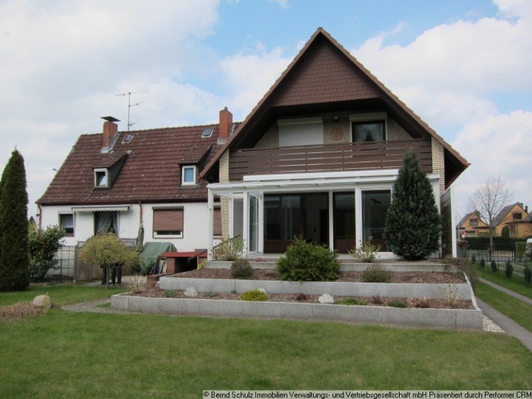 Haus_Terrasse Hamburg-Lurup Einfamilienhaus Sehr gepfegtes Zweifamilienhaus mit S�dgrundst�ck direkt am Volkspark