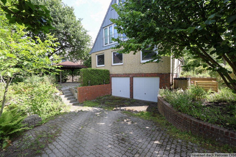 04 Objektansicht Westseite + Doppelgarage Einfamilienhaus Hamburg